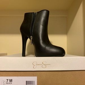 Black Jessica Simpson zipper bootie.